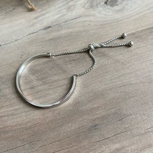 White Rhodium over Stainless Steel Curved Bar Slider Bracelet